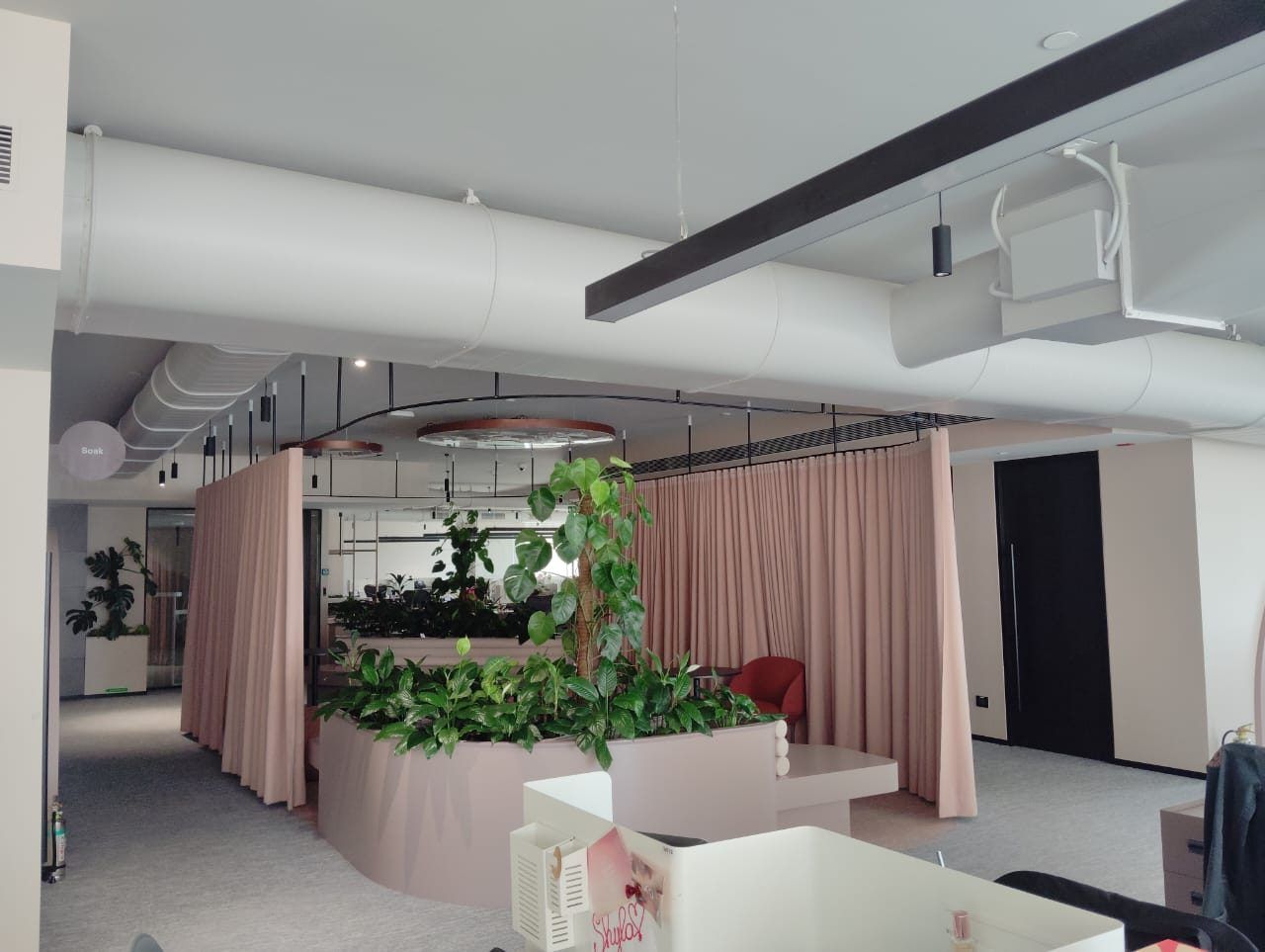 Office interior with exposed ductwork