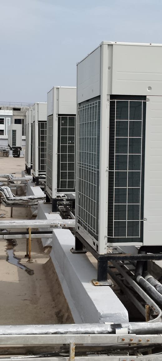 VRF outdoor units and pipework on the roof